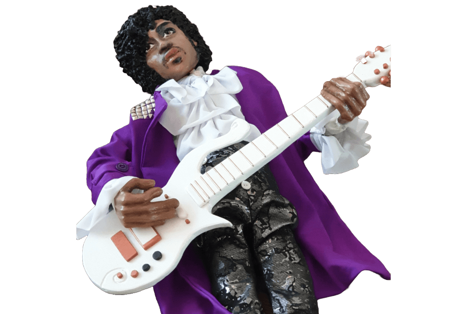 Papier-maché marionet van Prince.
